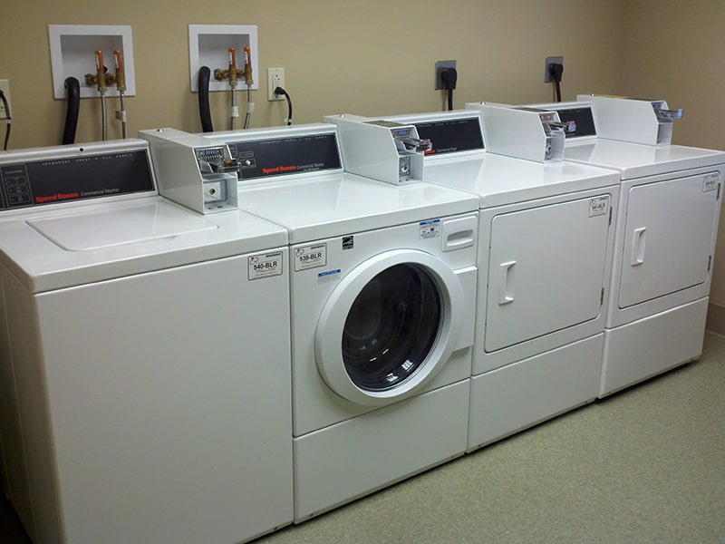 Margaret Wagner Apartments washers and dryers in laundry room