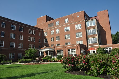 Margaret Wagner Apartments front entrance, patio and garden